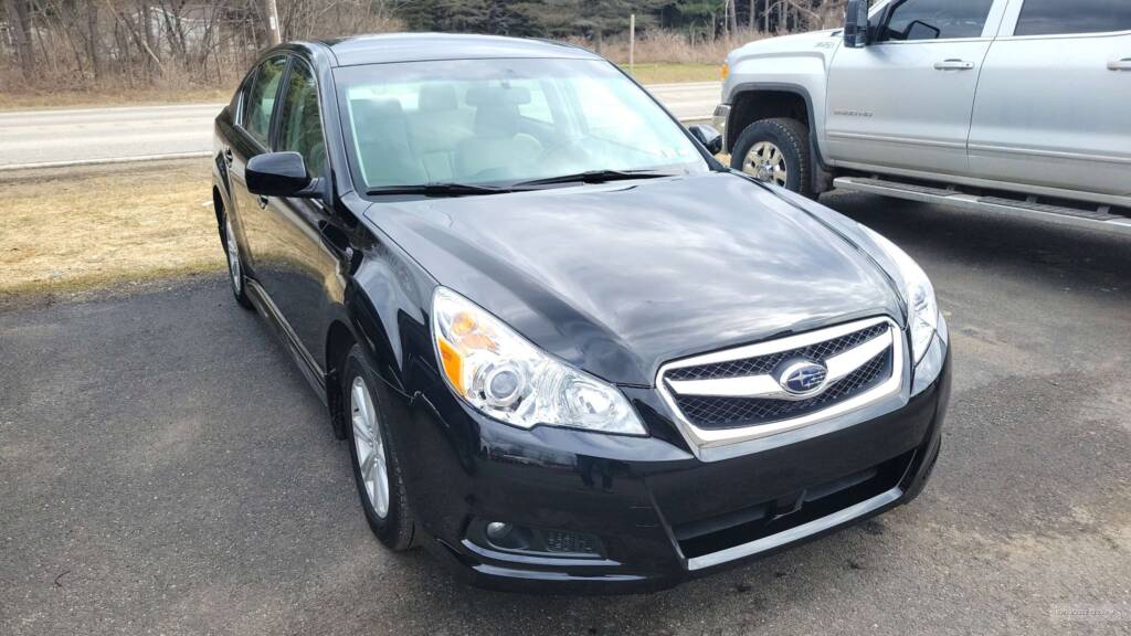Full repair job by Eldred Collision in Edinboro PA on a black Subaru Legacy.