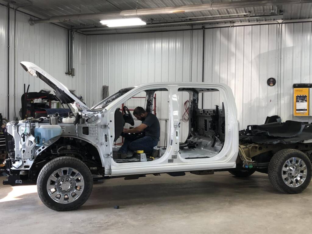 Full body repair job on a white truck by Eldred Collision in Edinboro PA